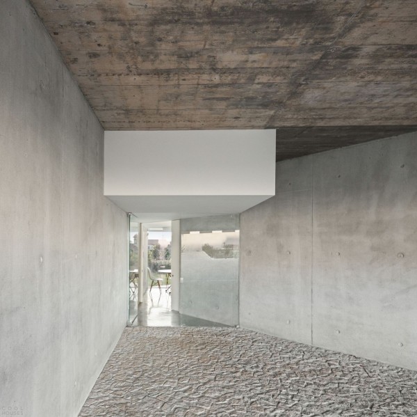 Минималистичный бетонный дом с внутренним двором Минималистичный бетонный дом с внутренним двором