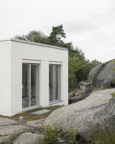 Скульптурная бетонная вилла в суровом рельефе Скульптурная бетонная вилла в суровом рельефе